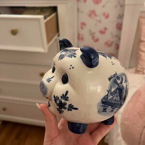Cute blue and white ceramic piggy bank